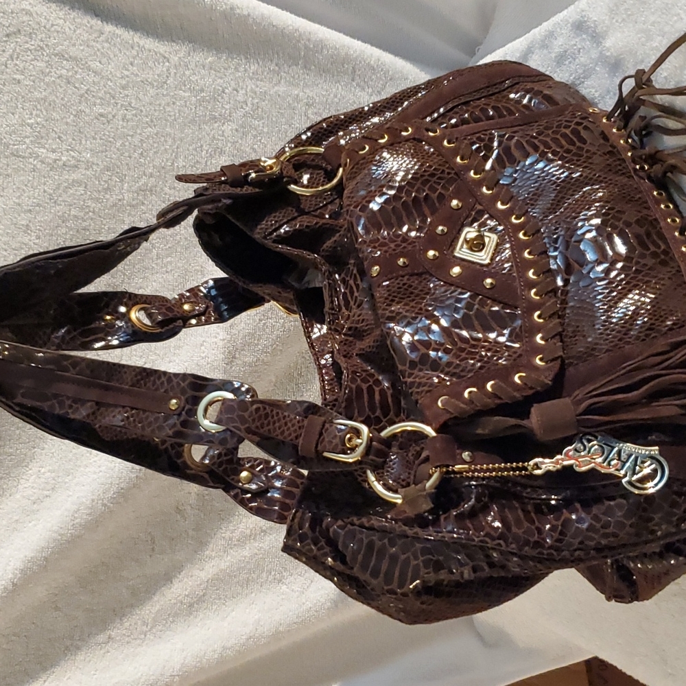 Carlos Santana purse